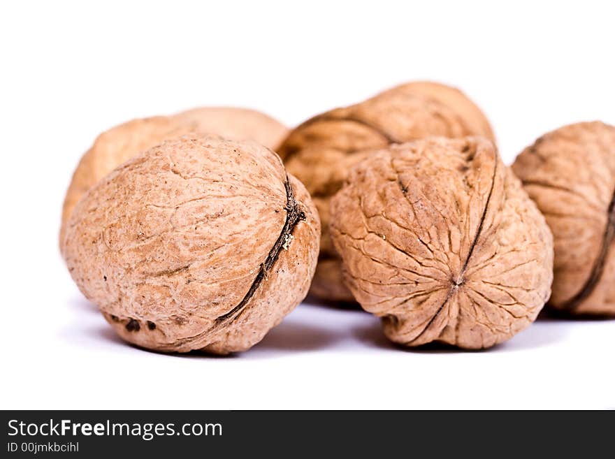 Walnuts close up isolated on white background