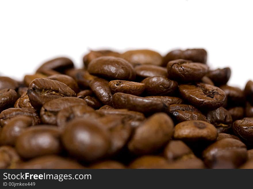 Coffee beans closeup on white background