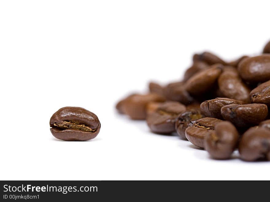 Coffee beans closeup on white background