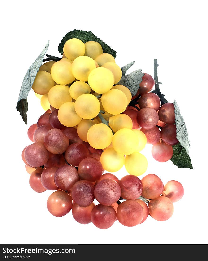 Two branches of grapes, purple and yellow, on a pure white background,. Two branches of grapes, purple and yellow, on a pure white background,