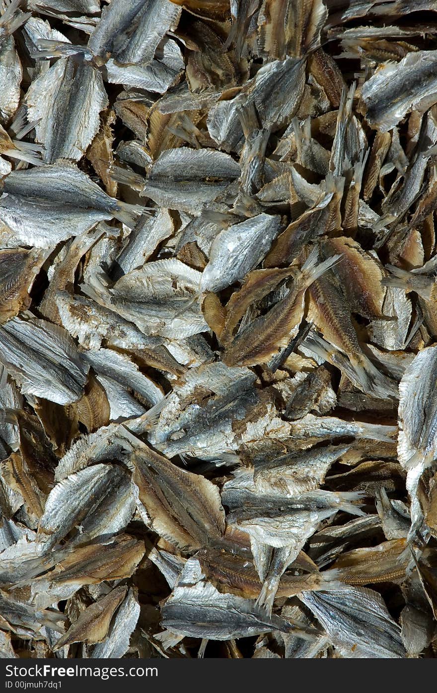 Lots of sliced dried salty fish or anchovies. Lots of sliced dried salty fish or anchovies