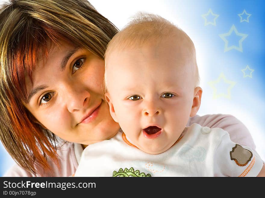 Sleepy baby with his mum.