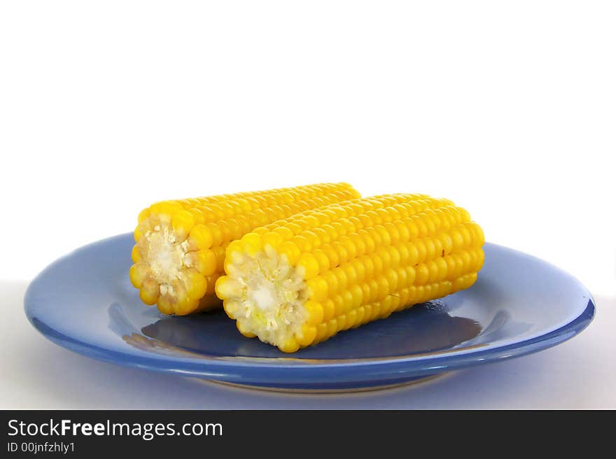 Two corns on plate