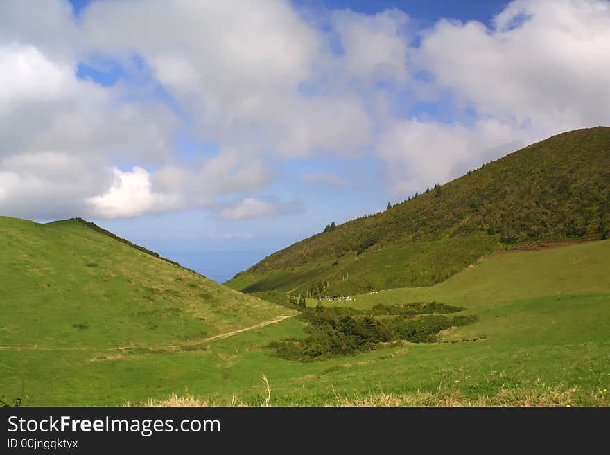 Dream landscape in azores portugal, green mountai with cloudy sky. Dream landscape in azores portugal, green mountai with cloudy sky