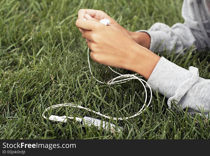 Headphones in hands