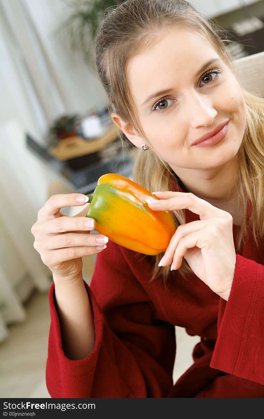 Portrait of woman with paprika