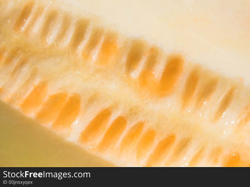 Close-up of a piece of an orange melon. Close-up of a piece of an orange melon.