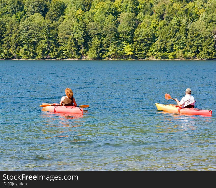 Two Kayakers on Canadice Lake, one of the Finger Lakes in New York State