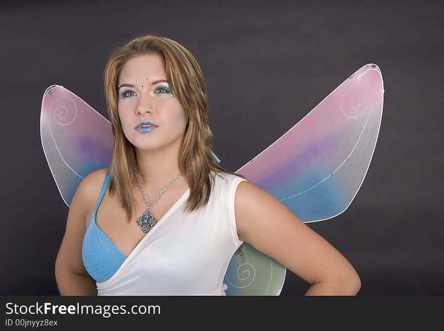 Pretty young woman dressed as fairy. Pretty young woman dressed as fairy