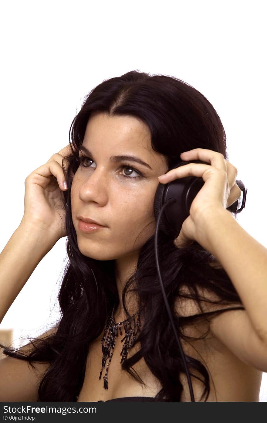 Portrait of young hispanic brunette girl with headphones - isolated. Portrait of young hispanic brunette girl with headphones - isolated