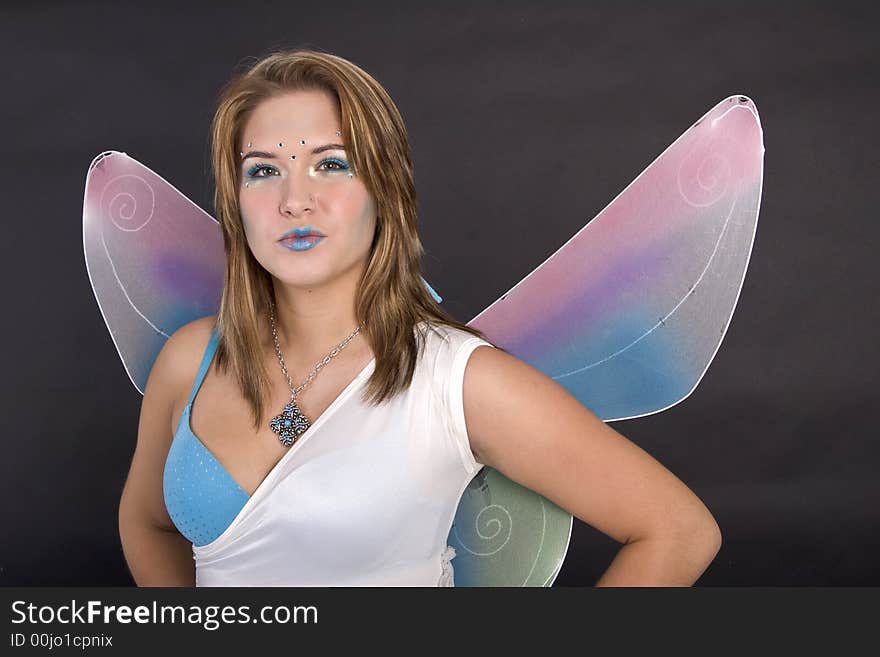 Pretty young woman dressed as fairy. Pretty young woman dressed as fairy