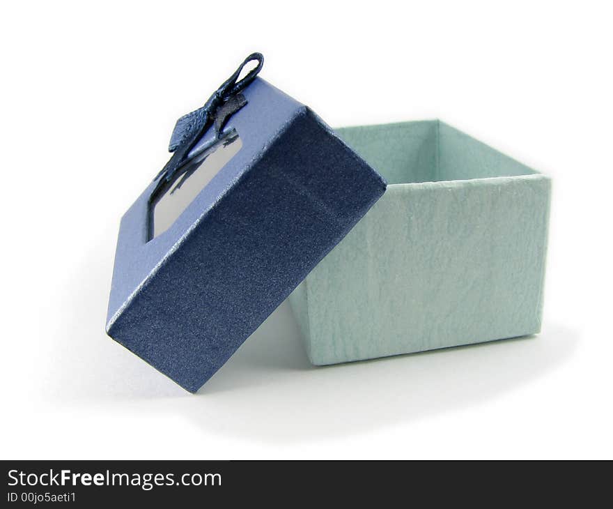 A beautiful small dark blue and light green gift box with see through lid.