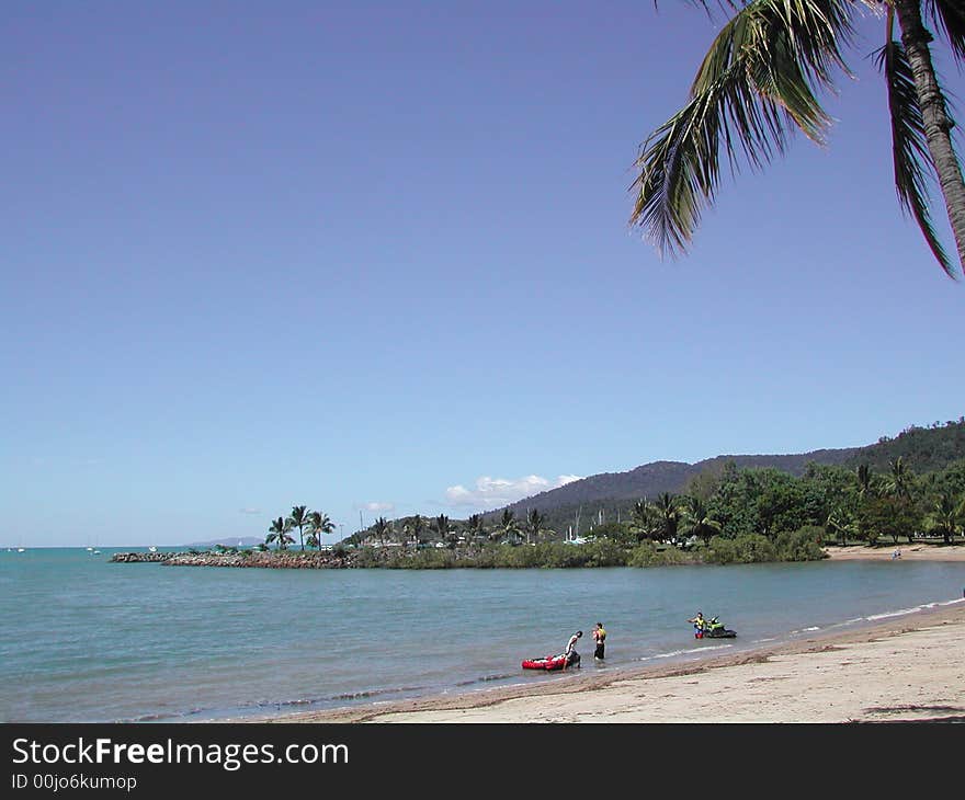 View of beautiful beach against blue sky. View of beautiful beach against blue sky