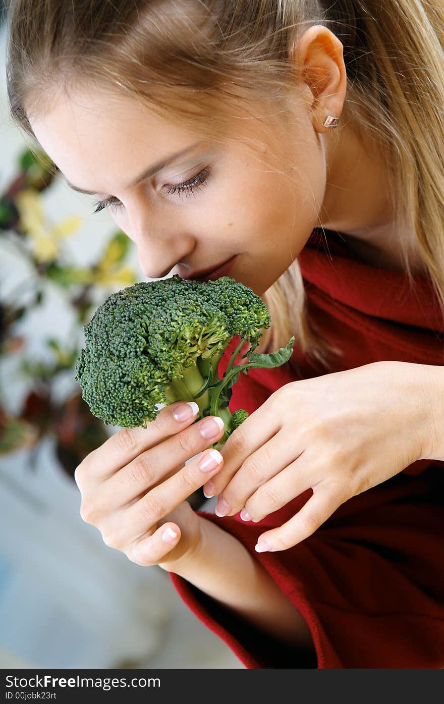 Woman with brocolli