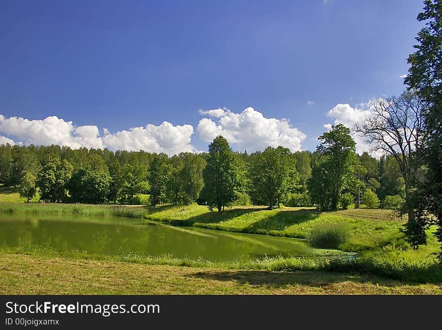 Landscape with blue sky, clouds, forest and lake. Landscape with blue sky, clouds, forest and lake