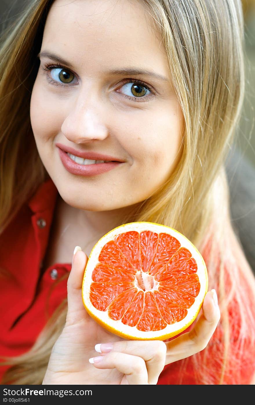 Portrait of woman with fruit