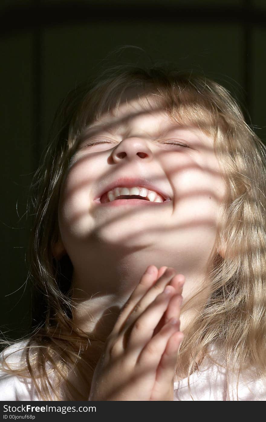 A portrait of girl in a striped light. A portrait of girl in a striped light