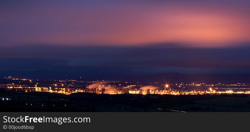 Oil refinery at dusk