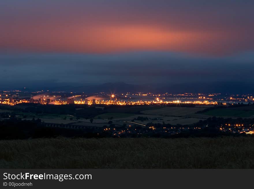 Oil refinery at dusk