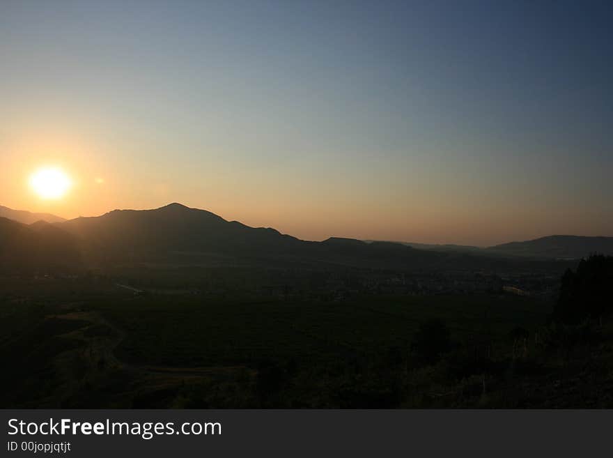 Sunrise is photographed in the mountains. Sunrise is photographed in the mountains