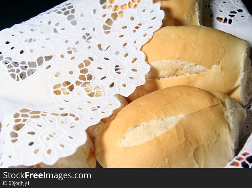 Basket with breads over  black background. Basket with breads over  black background