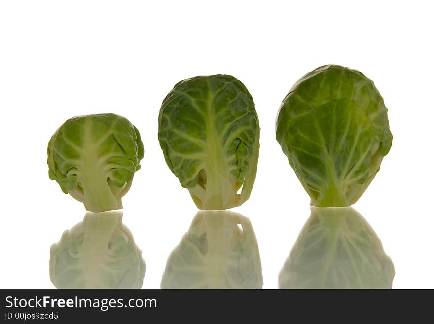 Brussels sprouts isolated over white background. Brussels sprouts isolated over white background