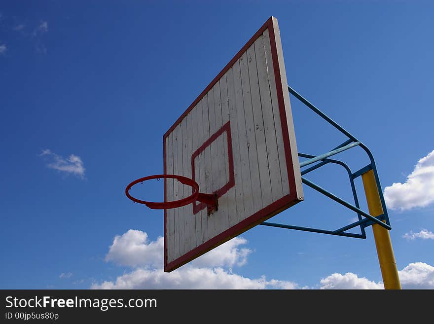 White wooden omnious basketball board