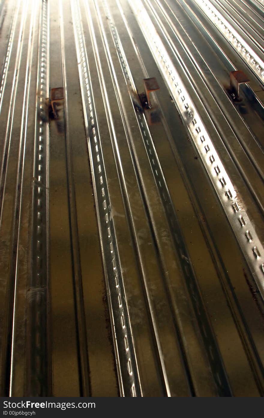 Some coroggated steel laying on the ground on a construction site. Some coroggated steel laying on the ground on a construction site