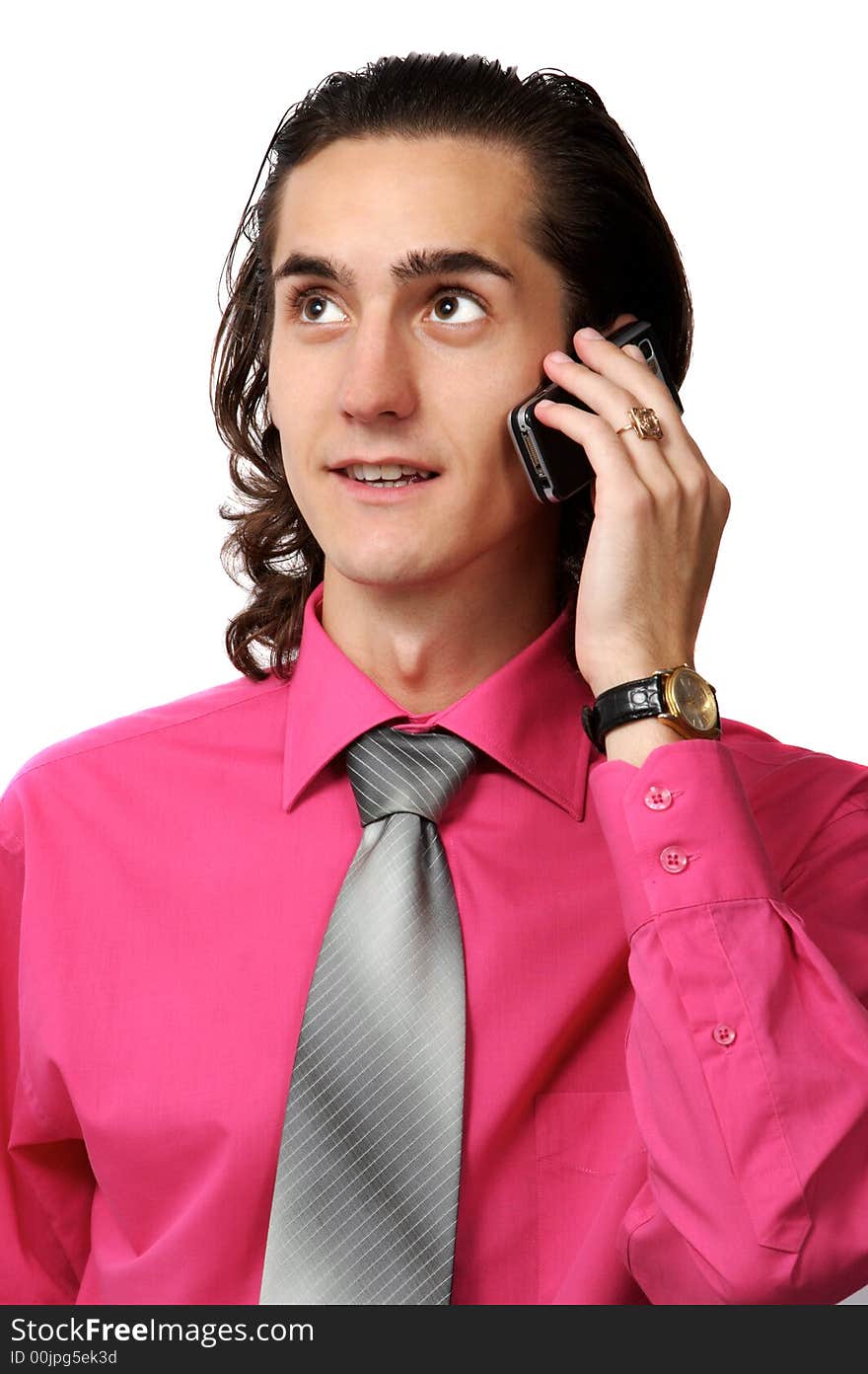 Sexy emotional business man in red shirt on the phone
white. Sexy emotional business man in red shirt on the phone
white