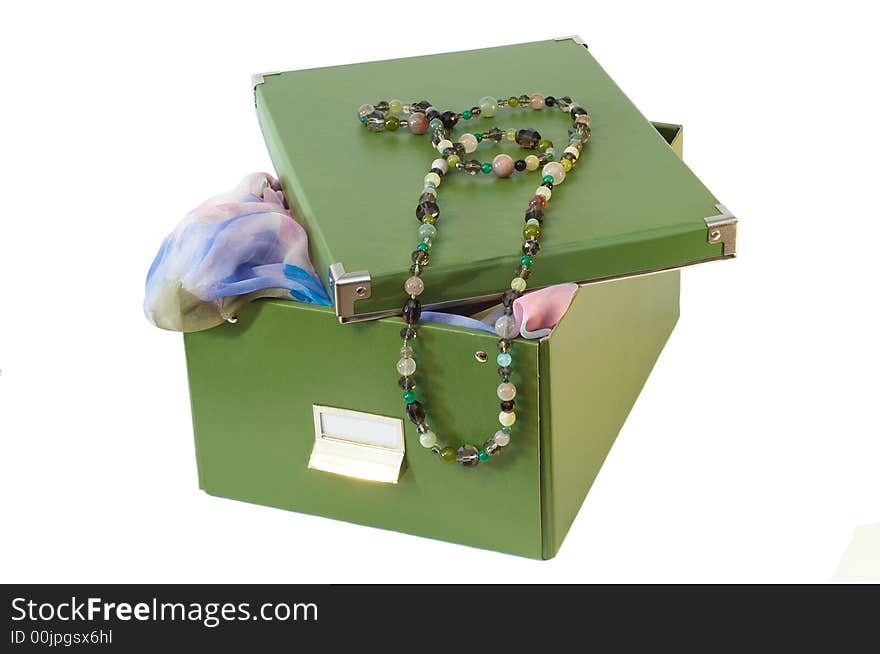 Green box with glassbeads on it and neckerchief. Green box with glassbeads on it and neckerchief