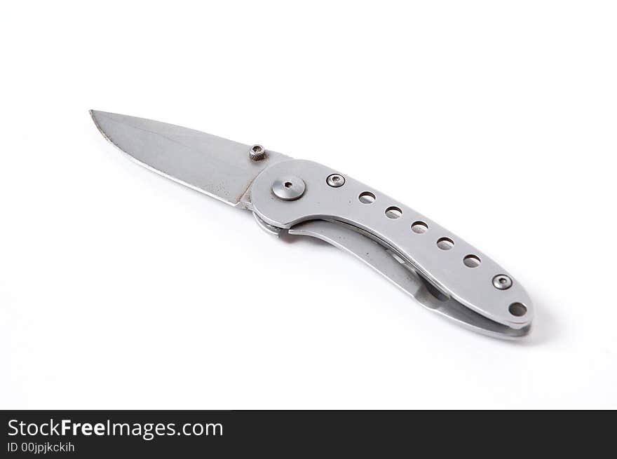 Penknife on the table isolated