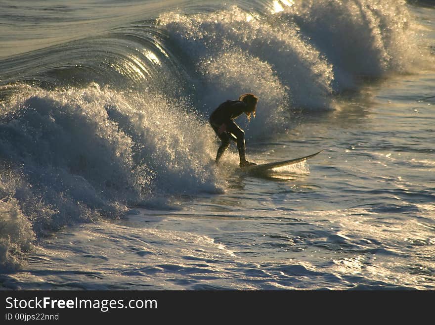 Man surfing on wave in the water. Man surfing on wave in the water