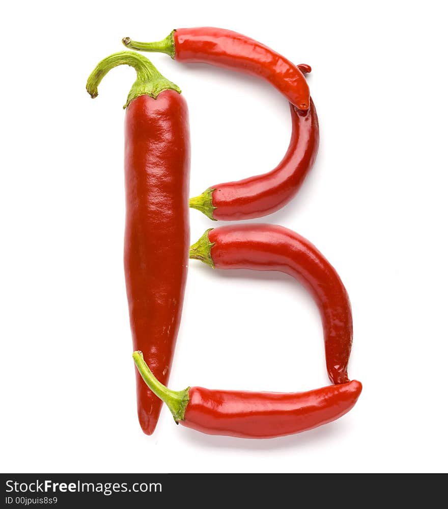 Close up view of the letter made of pepper. Close up view of the letter made of pepper