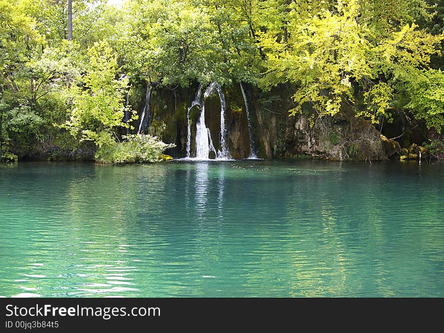 Beautiful turquoise lake and waterfall