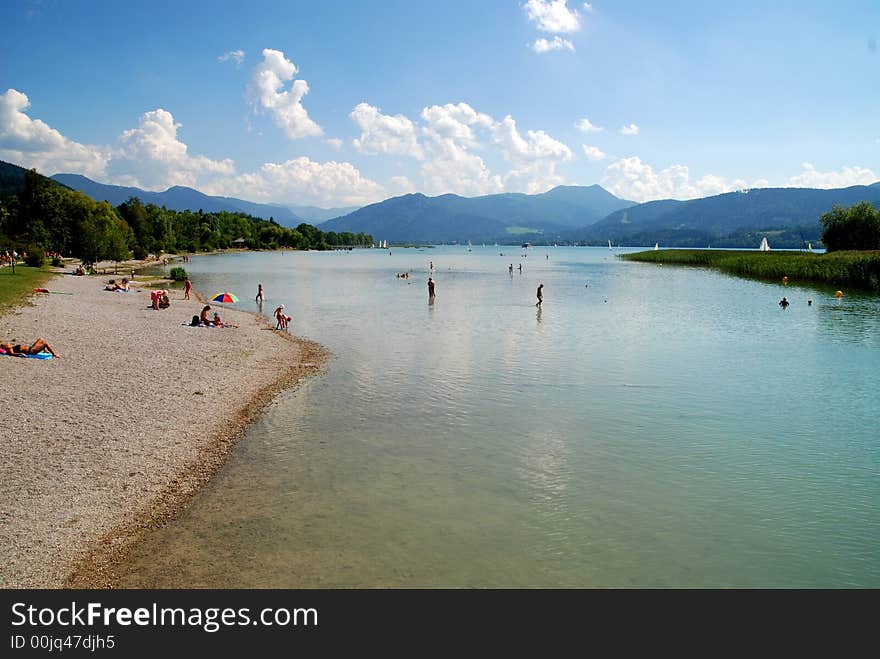 People bathing in a  sea. Tegernsee bavaria. People bathing in a  sea. Tegernsee bavaria