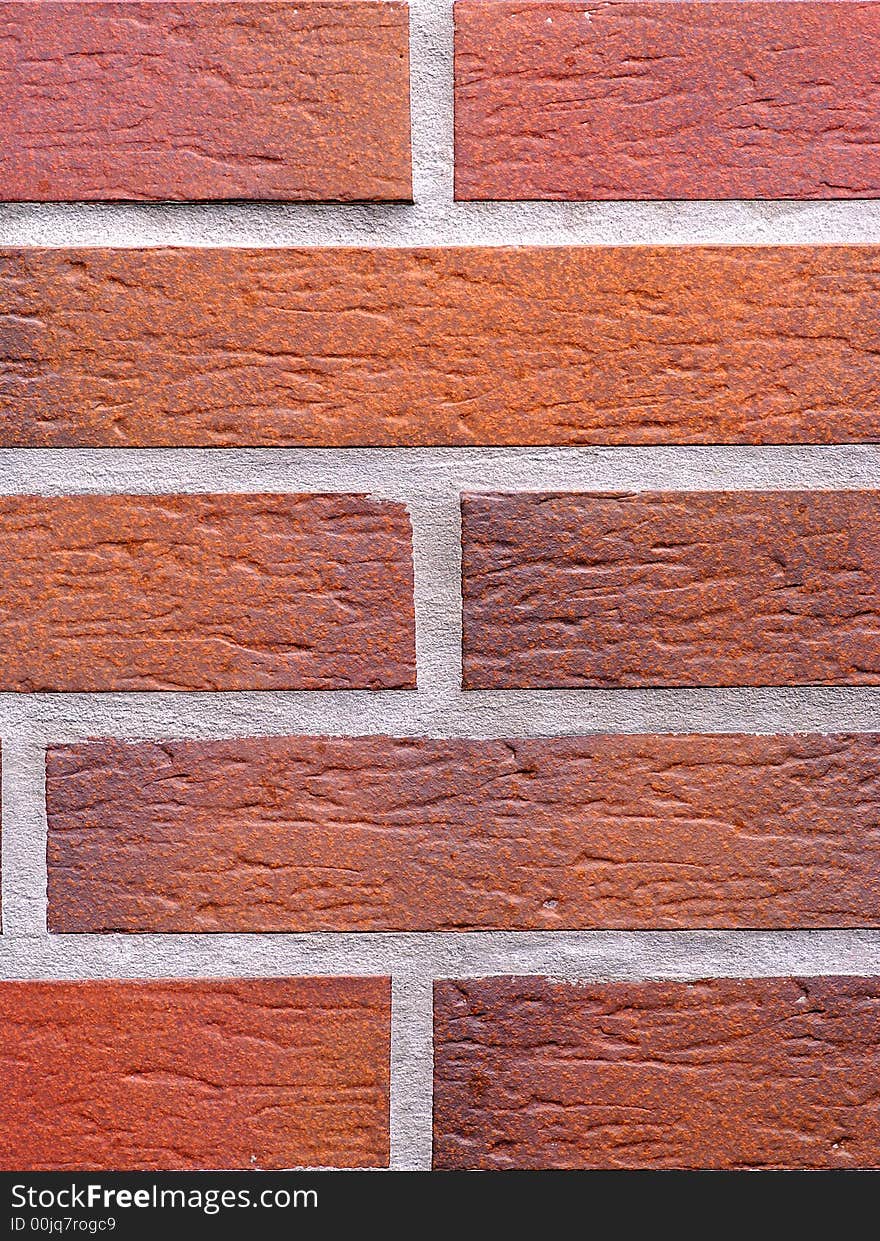 Red and orange brick wall texture. Red and orange brick wall texture