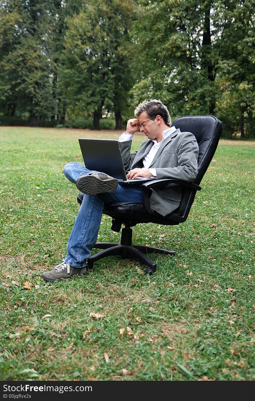 Man working in a field feeling down. Man working in a field feeling down