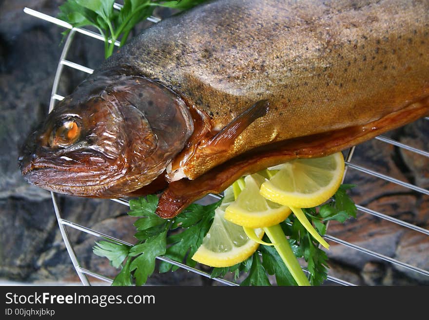 Trout grilled to perfection and served with lemon and parsley. Trout grilled to perfection and served with lemon and parsley