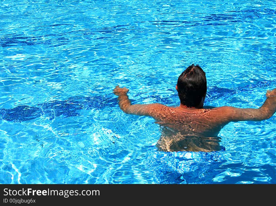 Relax in the pool in the resort