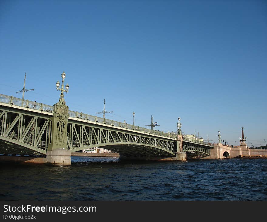 The bridge through the river. The bridge through the river