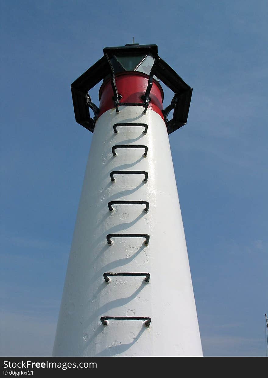 Small lighthouse in a port