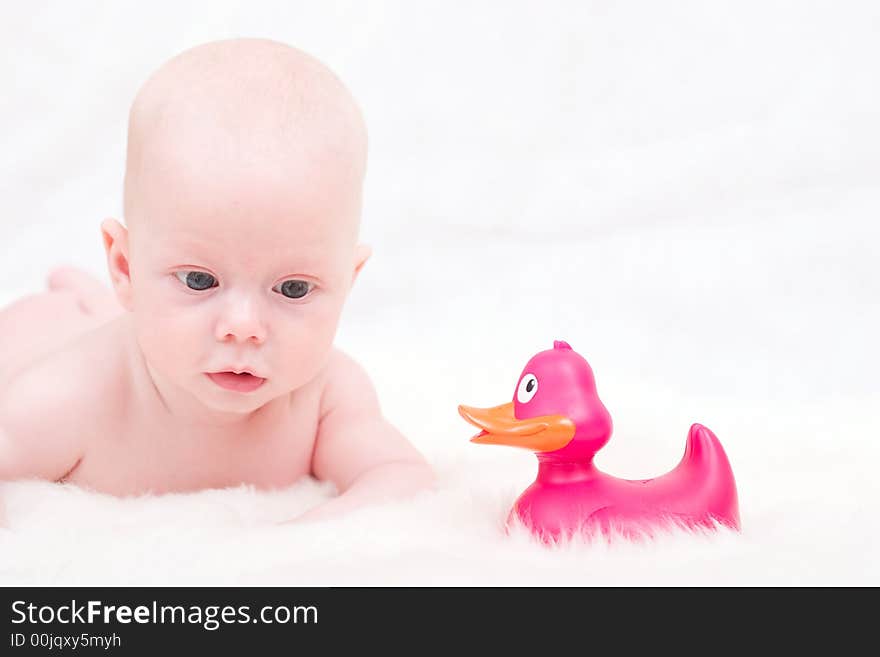 Little cute baby - 3-month boy with toy. Little cute baby - 3-month boy with toy