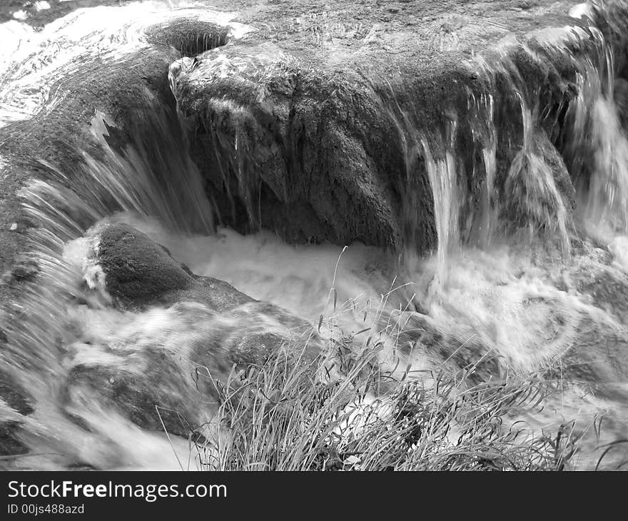 Waterfall in a national park, greyscale image