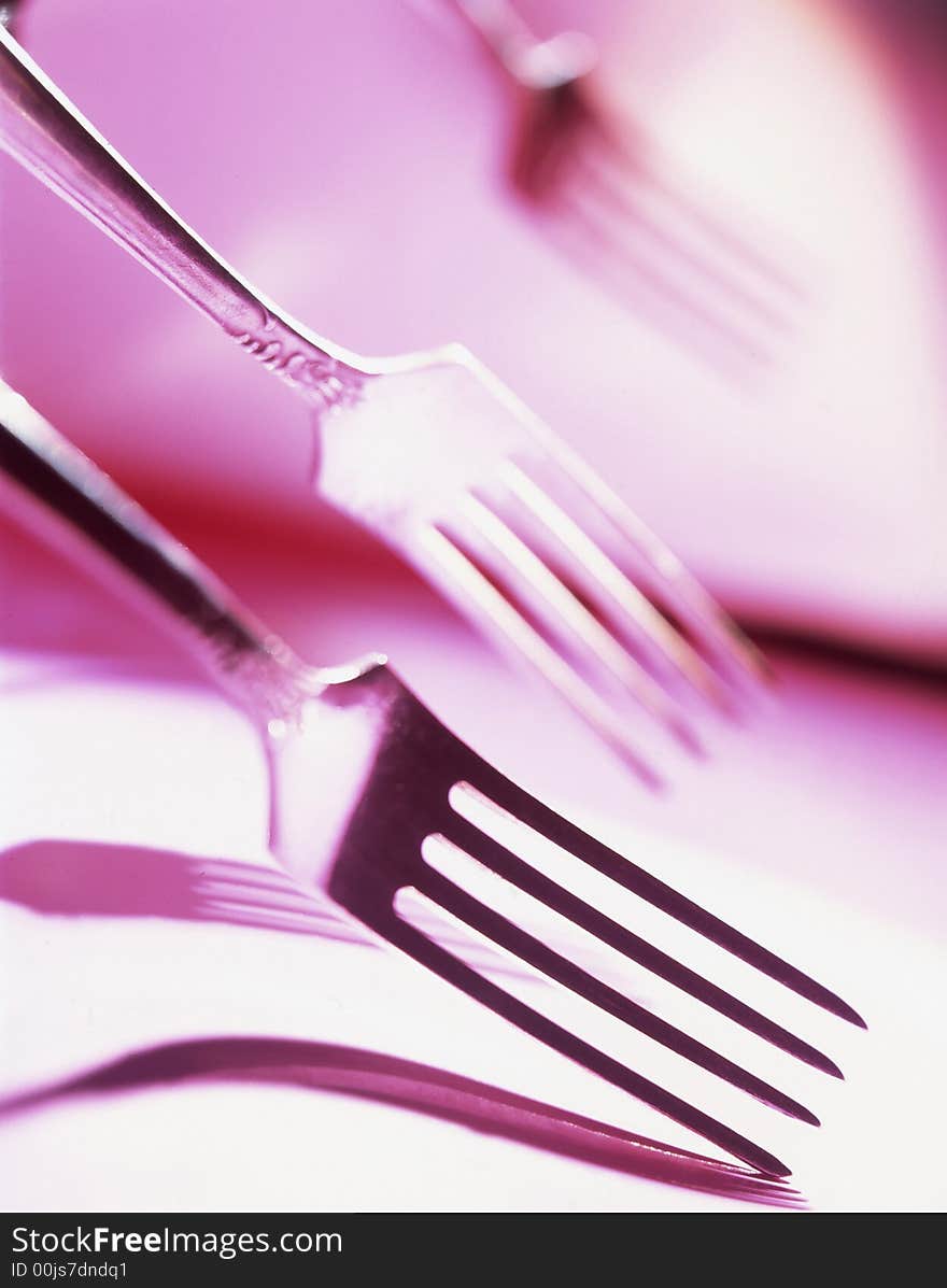 Iron plugs on a pink background