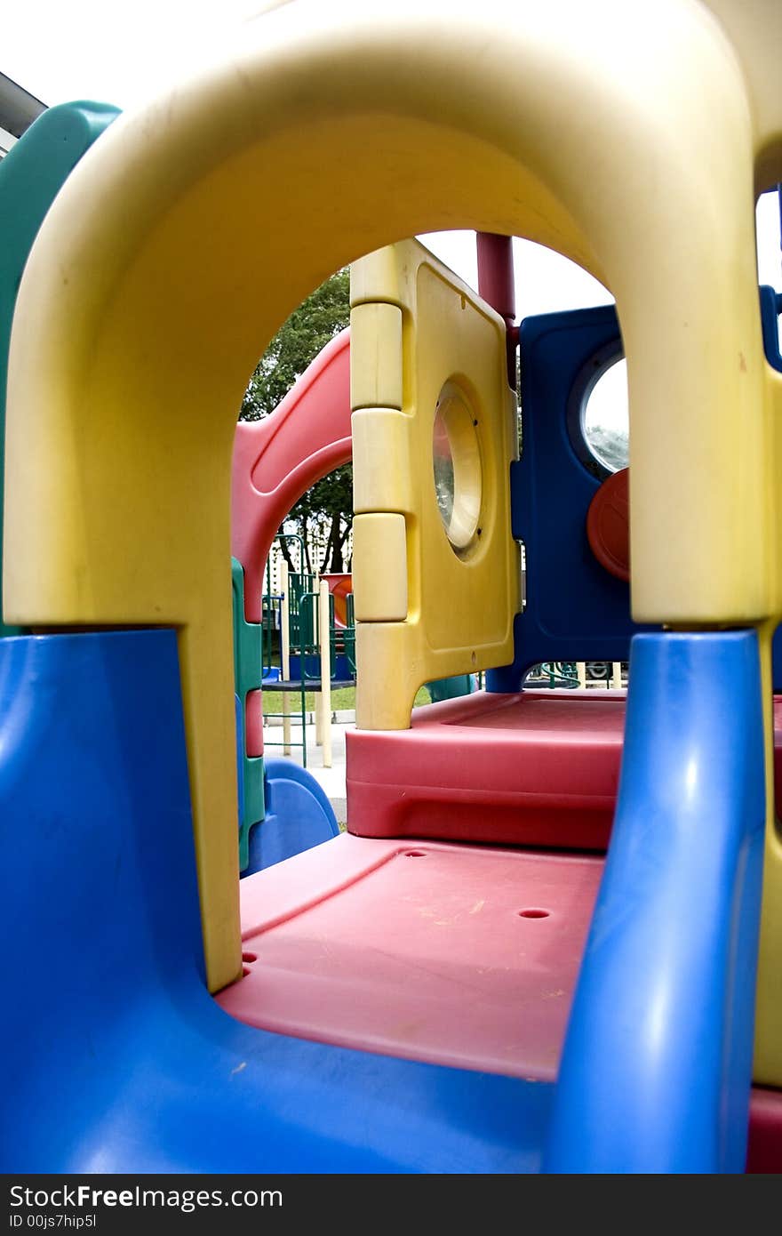 Close-up of a children plyaground, form up pattern of shapes and colors. Close-up of a children plyaground, form up pattern of shapes and colors.