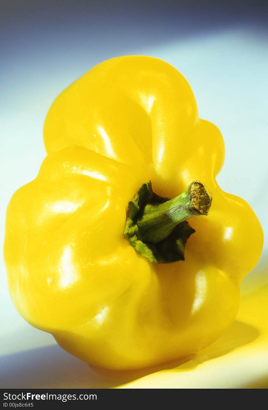 Yellow pepper on a white background