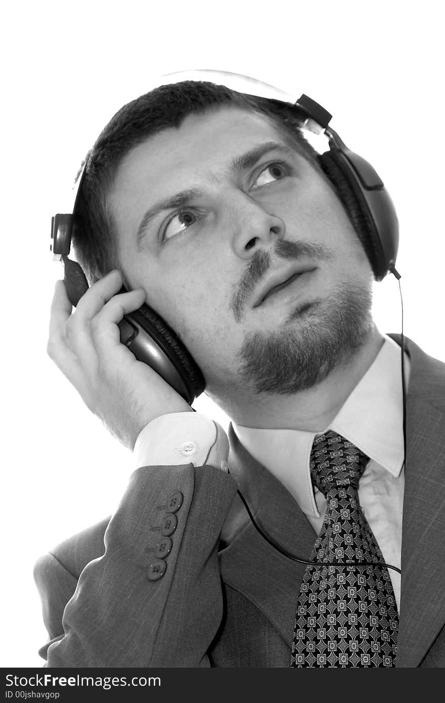 An image of businessman listening to music. An image of businessman listening to music