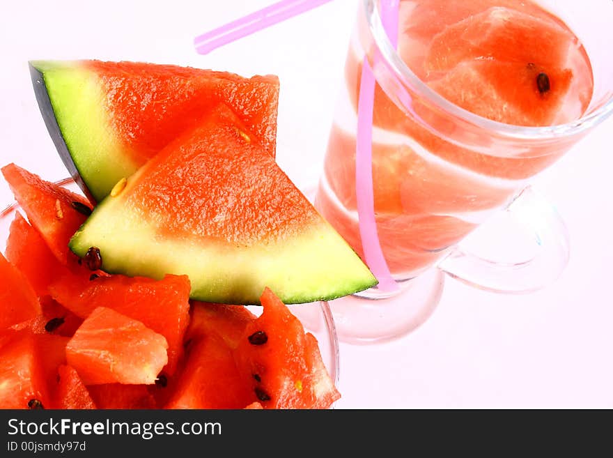 Background of brightly lit red watermelon slices. Background of brightly lit red watermelon slices.