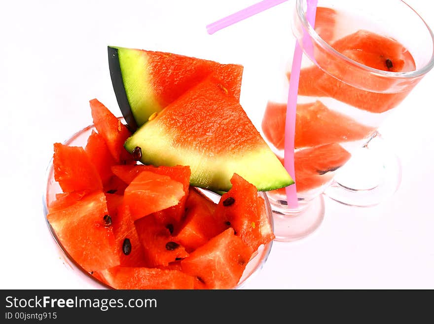 Background of brightly lit red watermelon slices. Background of brightly lit red watermelon slices.