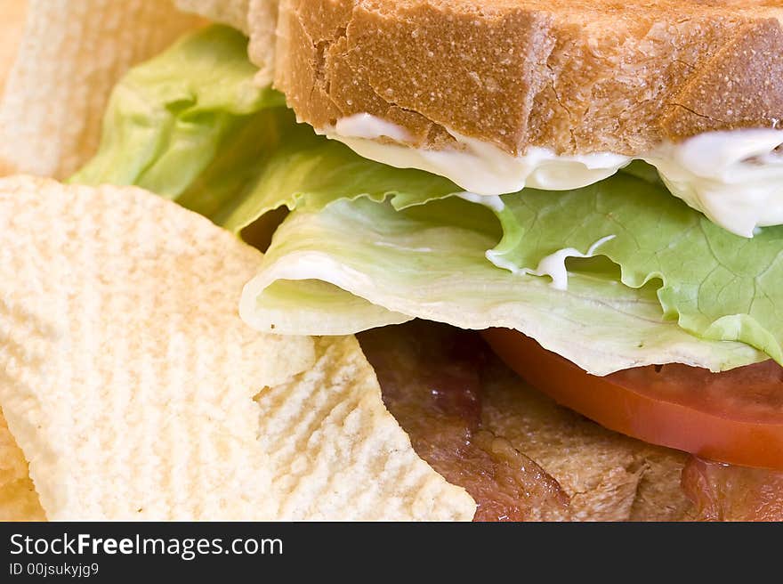 A fresh BLT sandwich with lots of bacon, fresh tomatoes, lettuce and mayo